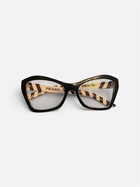 PRADA PR O7Y Symbole collection, which is known for its bold, geometric Frame